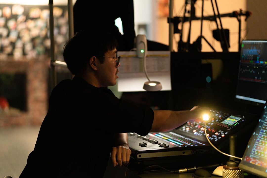 Broadcast control room with technicians monitoring live camera feeds