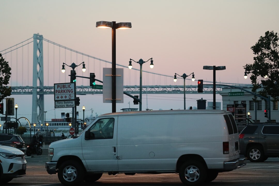Outside broadcast van with satellite mast raised at a live event